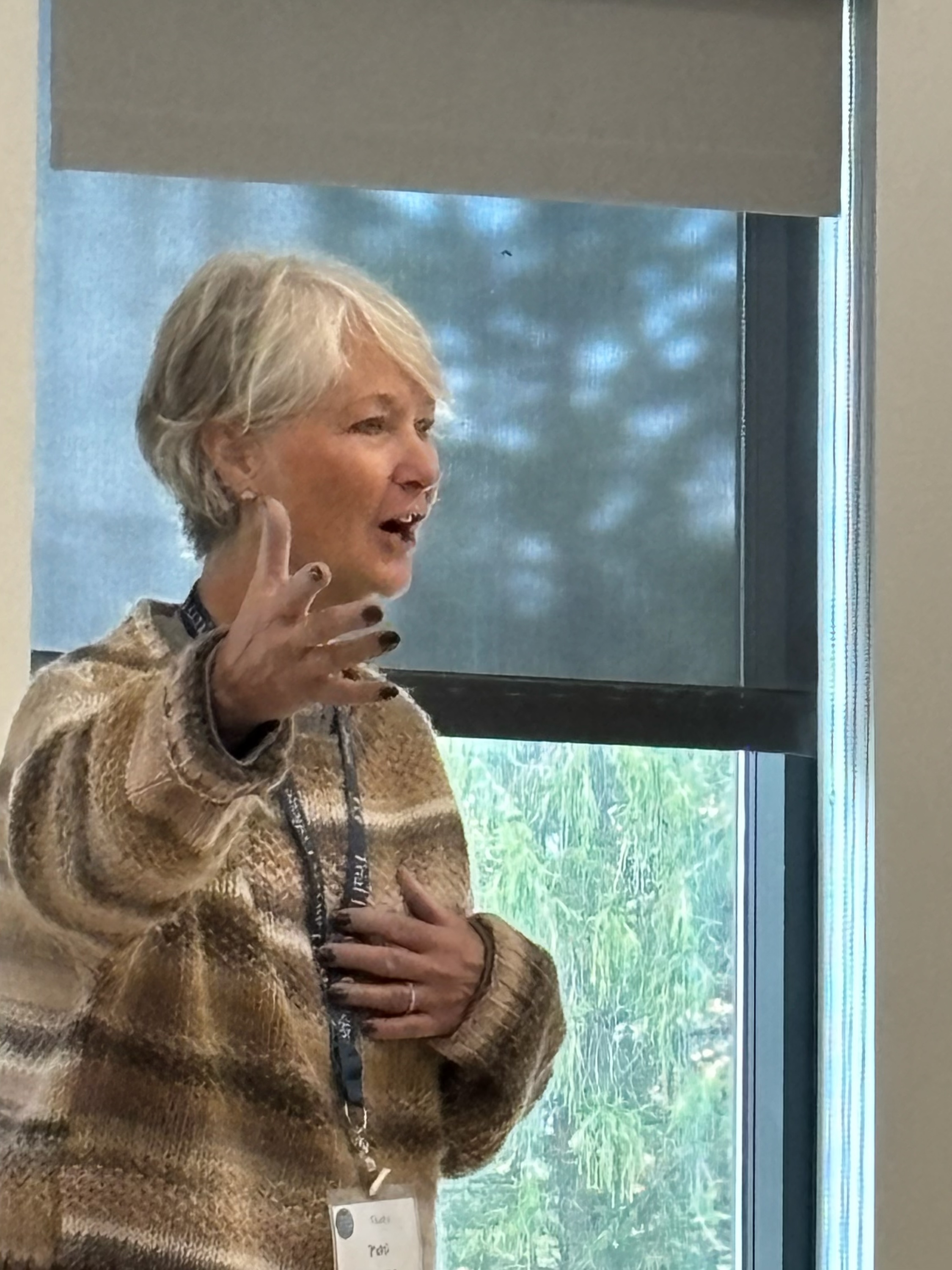 Person reading a book and smiling